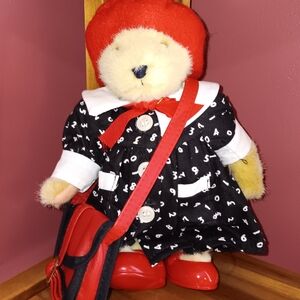 Red-Accented Plush Bear in Black Number-Print Dress